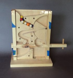 This gumball machine is one of the projects on Bob's workbench.